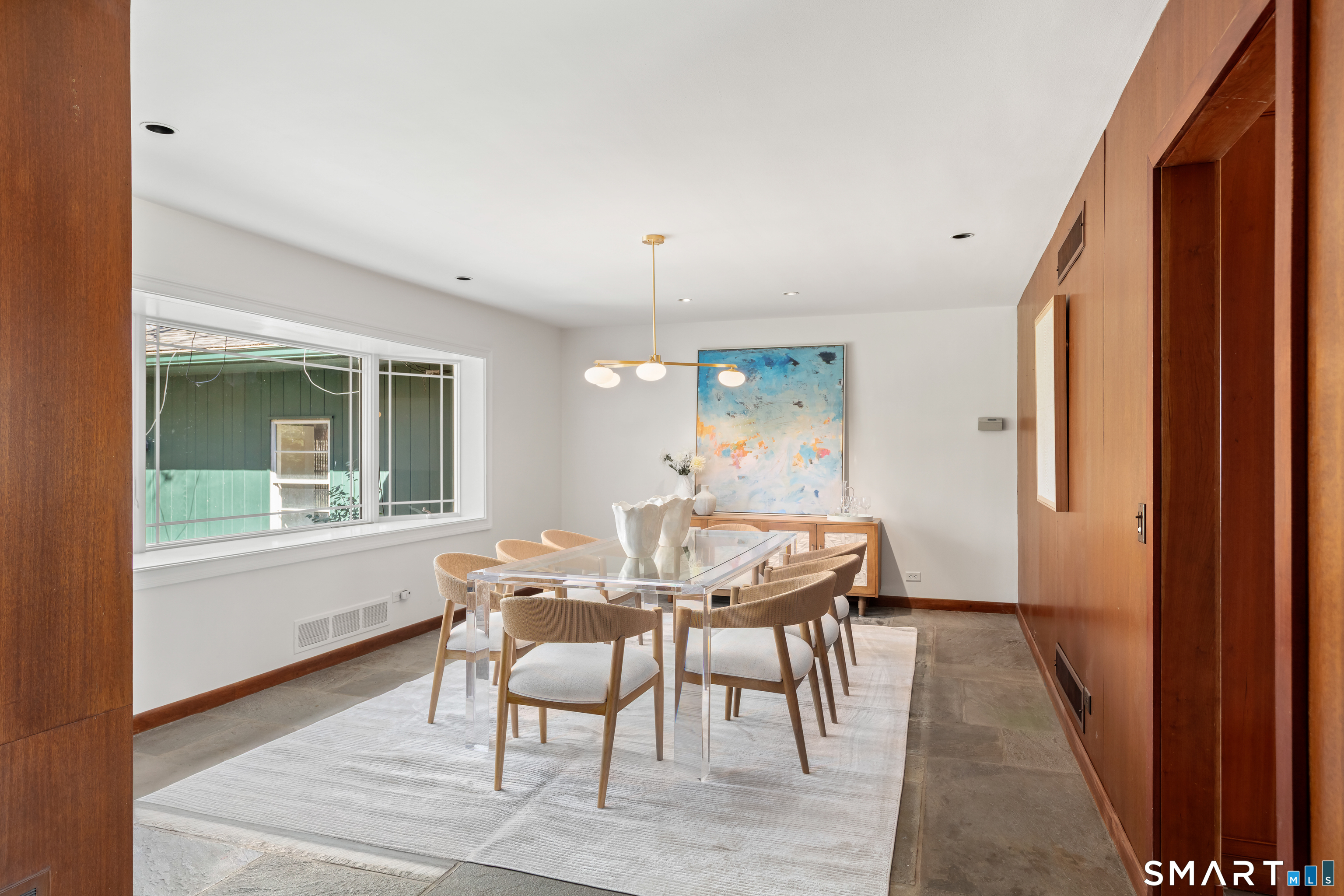 143 Palmer Hill Road Stamford, CT 06902 - Photo 10 of 40 a view of a dining room with furniture and window