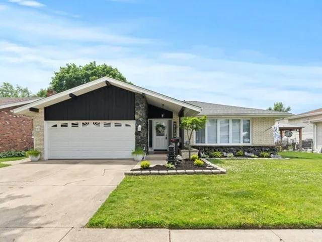 a house view with a garden space