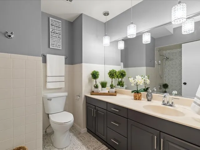 a bathroom with a bathtub and a shower