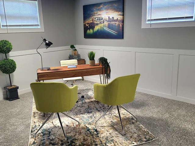 a bathroom with a sink mirror and vanity