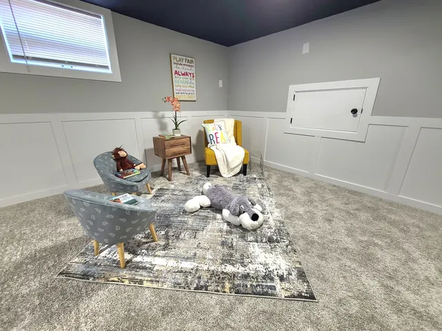 a garage with a table and chairs