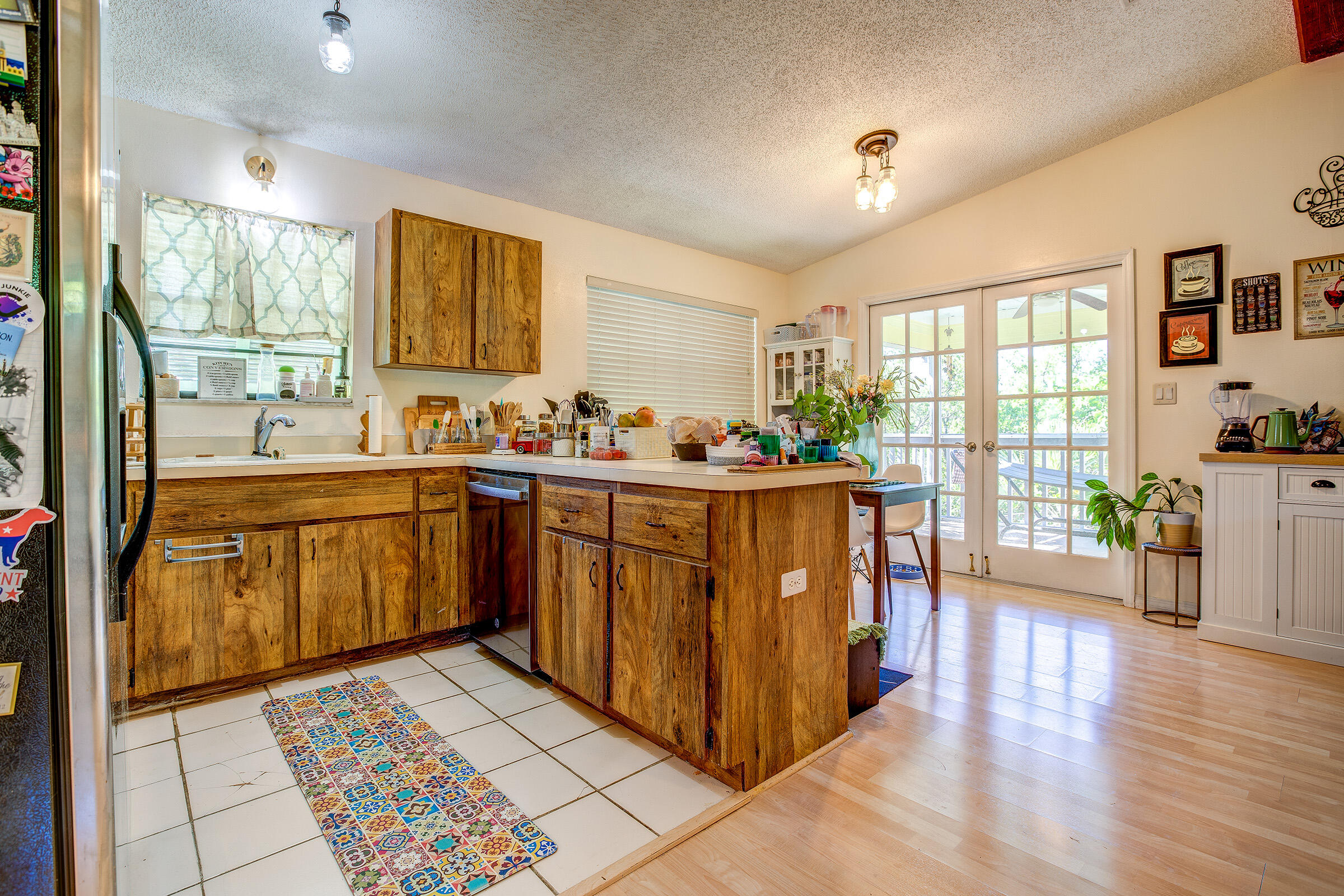 29784 Springtime Road Big Pine Key, FL 33043 - Photo 11 of 39 Kitchen and french doors to porch