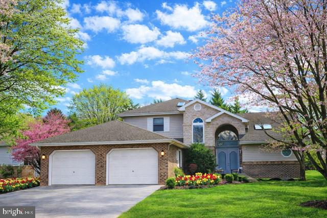 a front view of house with garden