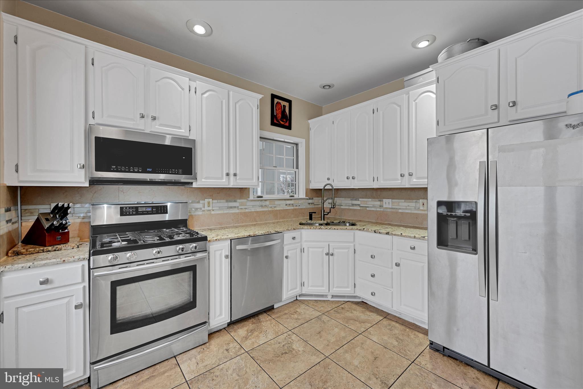 717 Brookside Lane Lebanon, PA 17042 - Photo 13 of 45 a kitchen with cabinets stainless steel appliances and sink