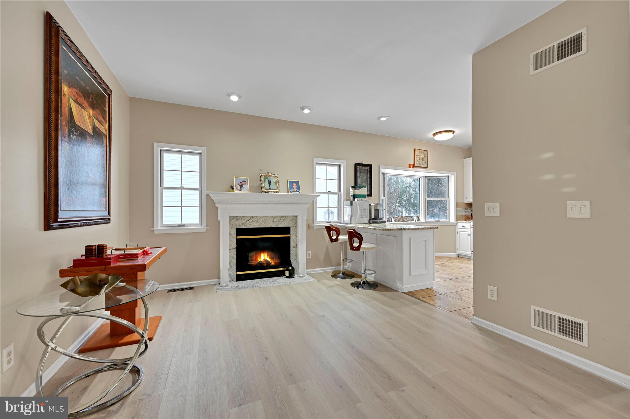 717 Brookside Lane Lebanon, PA 17042 - Photo 17 of 45 a living room with furniture and a fireplace