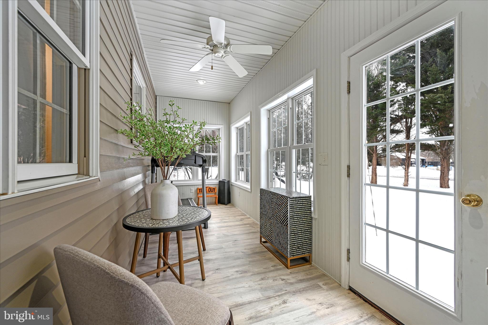 717 Brookside Lane Lebanon, PA 17042 - Photo 21 of 45 a dining room with furniture and potted plants