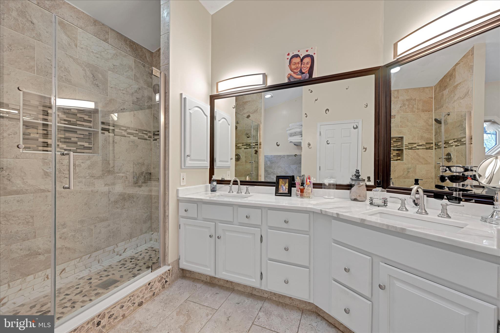 717 Brookside Lane Lebanon, PA 17042 - Photo 25 of 45 a bathroom with a double vanity sink mirror and shower