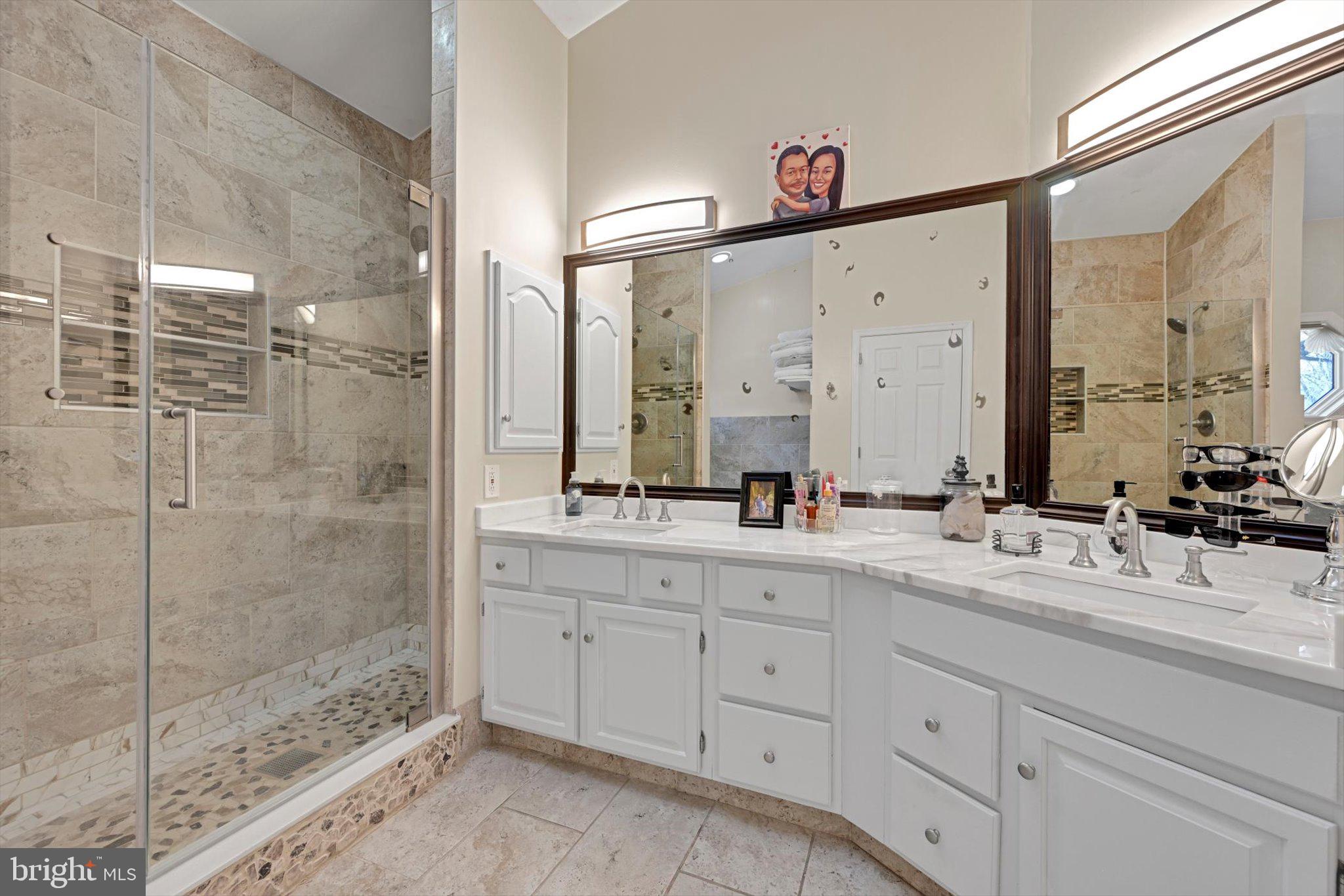 717 Brookside Lane Lebanon, PA 17042 - Photo 4 of 45 a bathroom with a double vanity sink mirror and shower