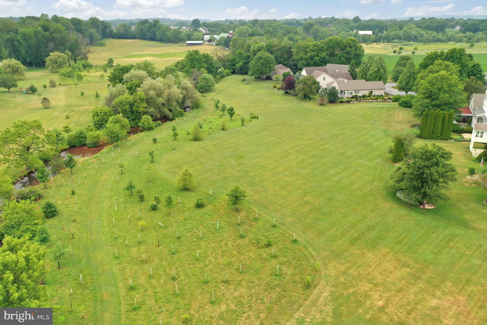 717 Brookside Lane Lebanon, PA 17042 - Photo 39 of 45 a view of a lake with houses