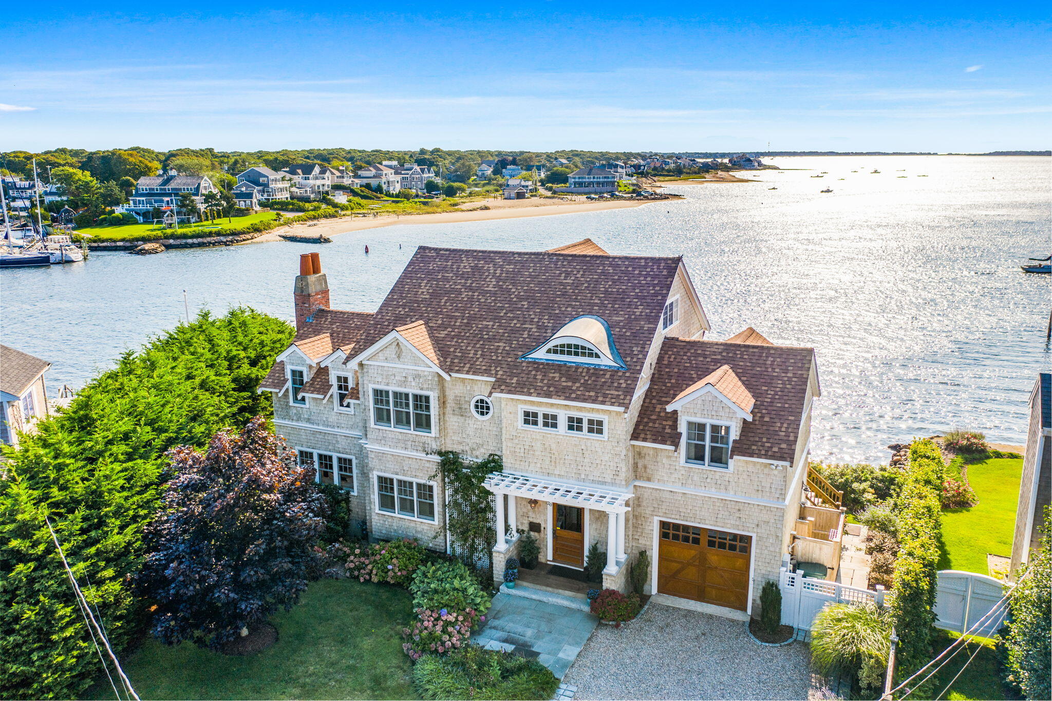 20 Bay Shore Road Hyannis, MA 02601 - Photo 1 of 42 an aerial view of house with yard ocean and trees all around