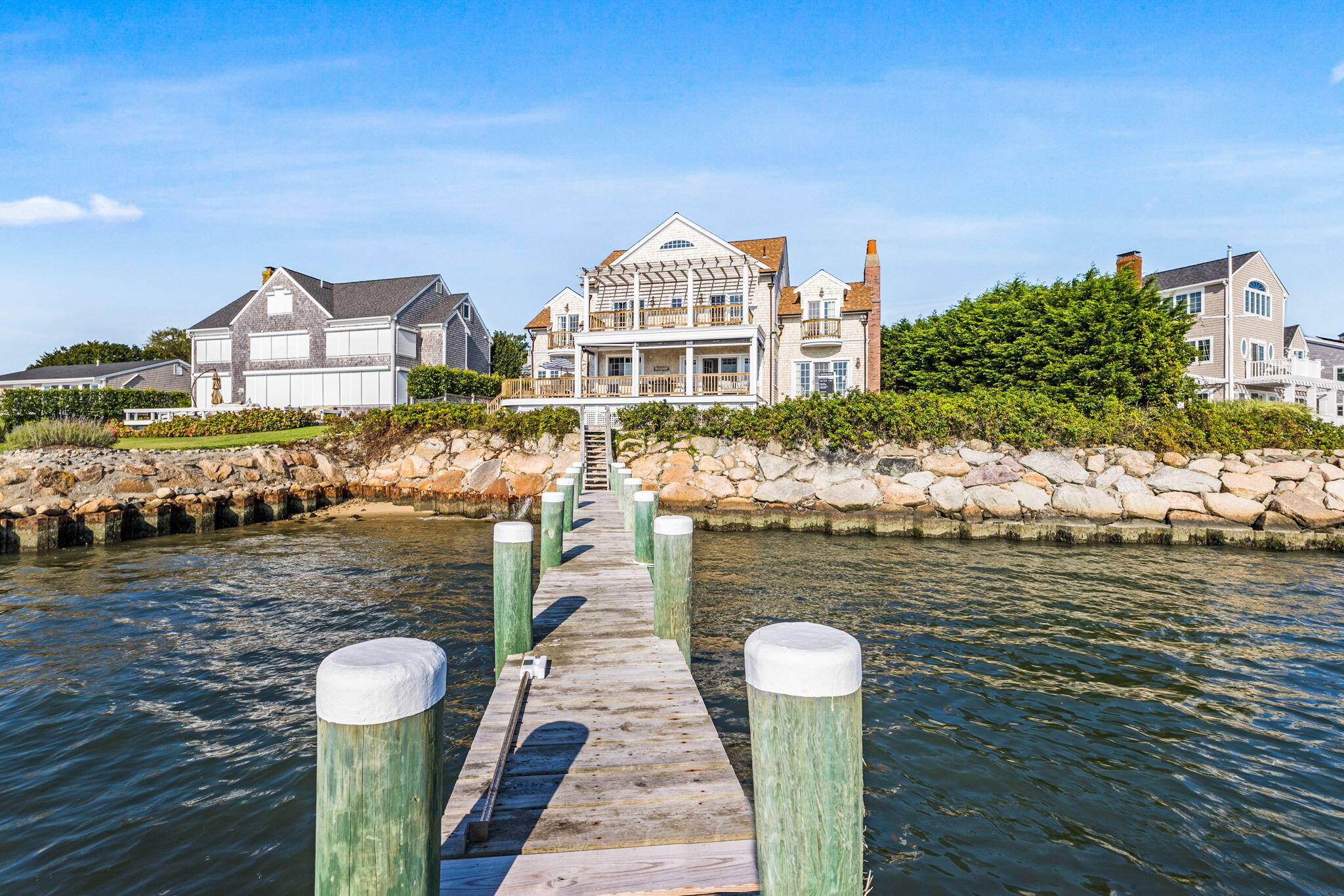 20 Bay Shore Road Hyannis, MA 02601 - Photo 3 of 42 a front view of a house with a ocean view