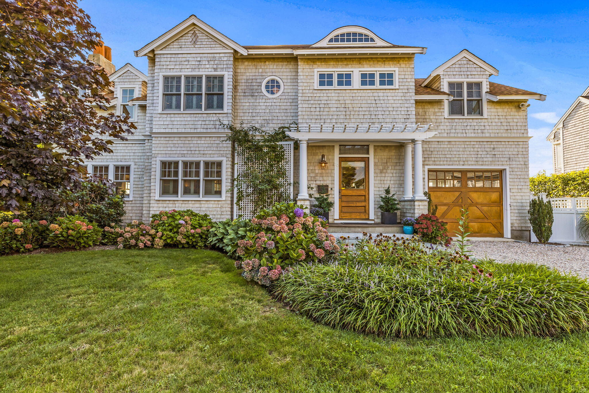 20 Bay Shore Road Hyannis, MA 02601 - Photo 6 of 42 a front view of a house with a yard