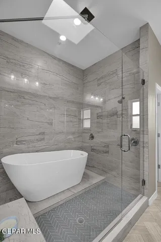 a white bath tub sitting in a bathroom