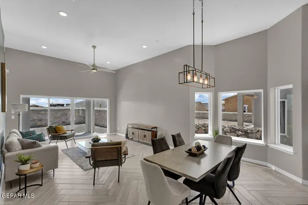 a view of a dining room with furniture window and wooden floor