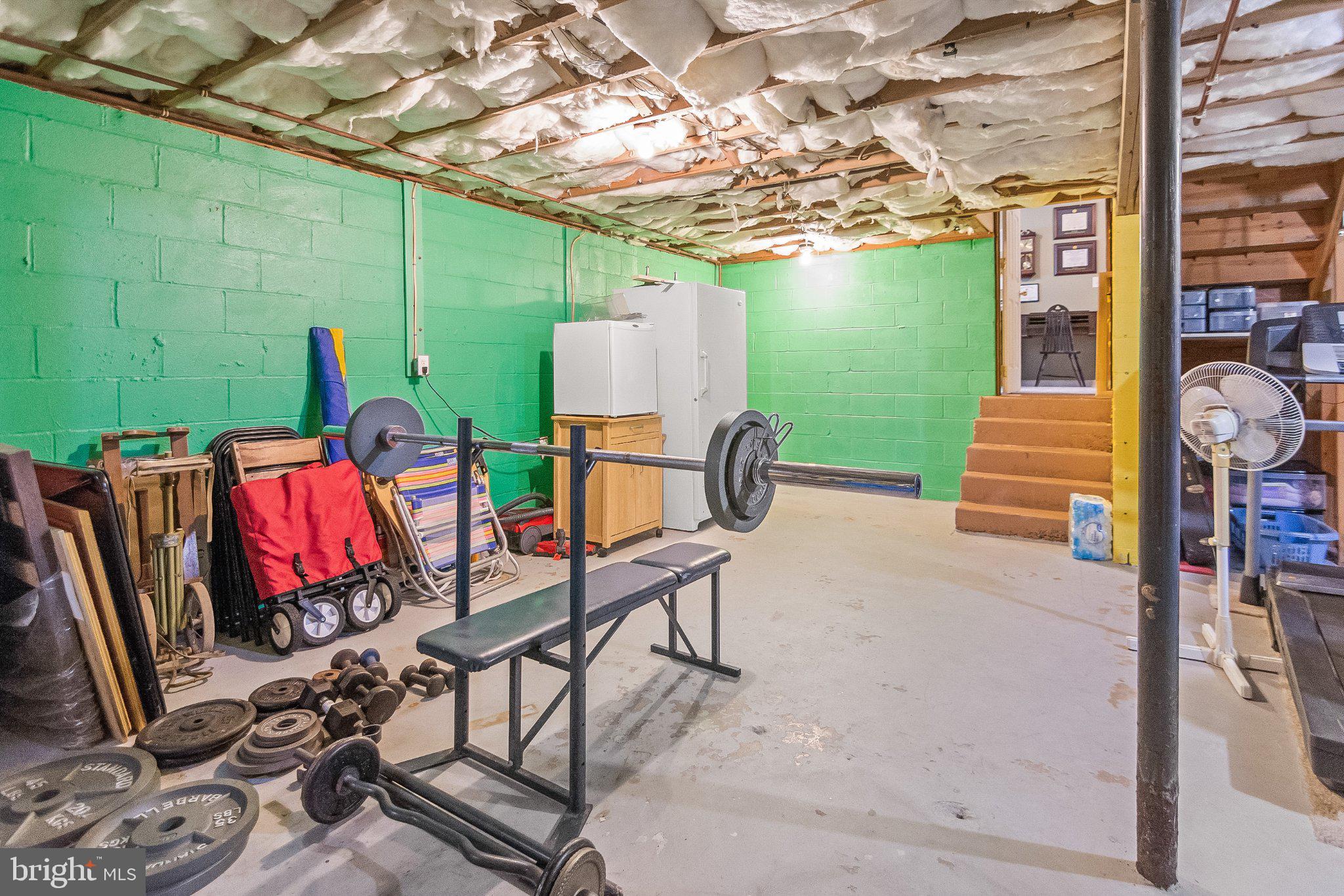 5412 Ridge Road Mount Airy, MD 21771 - Photo 36 of 38 Versatile basement gym space awaits!