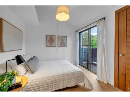 a bed room with a bed