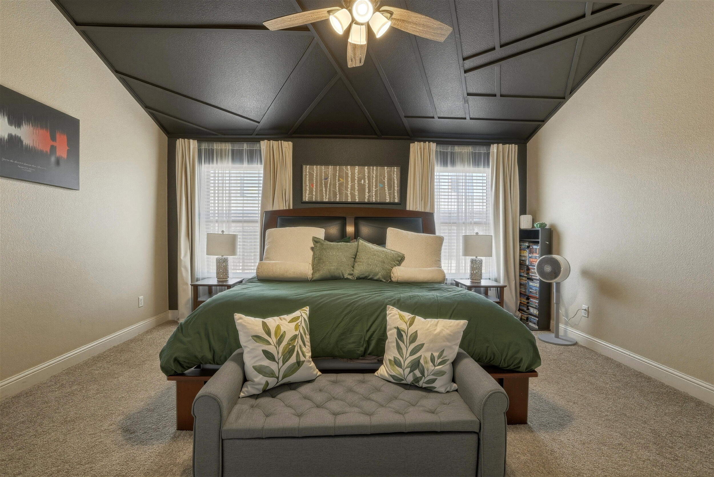 8808 Rochester Avenue Lubbock, TX 79424 - Photo 12 of 27 a living room with furniture and a chandelier