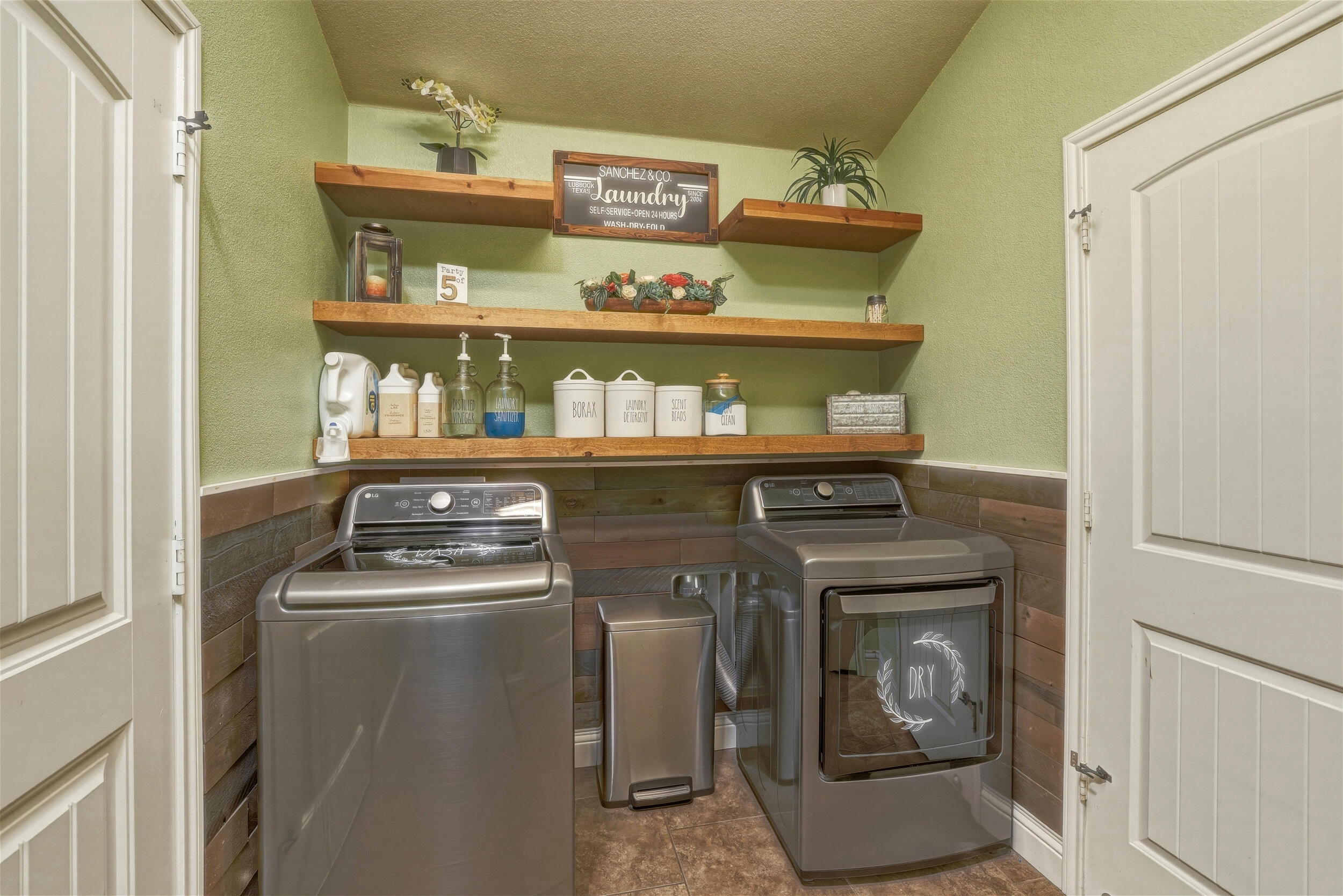 8808 Rochester Avenue Lubbock, TX 79424 - Photo 23 of 27 a room with storage and utility