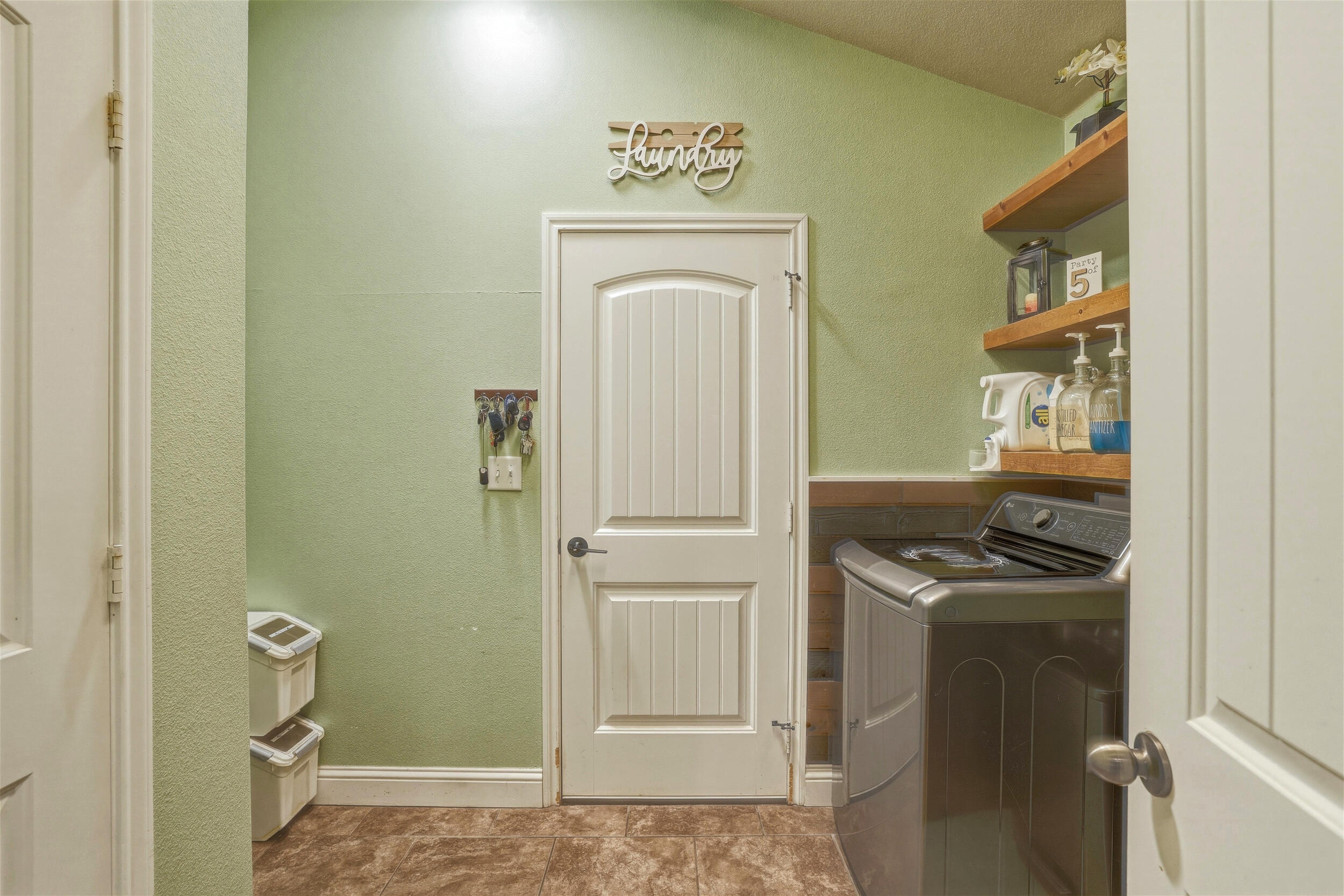 8808 Rochester Avenue Lubbock, TX 79424 - Photo 24 of 27 a view of a storage and utility room in a room