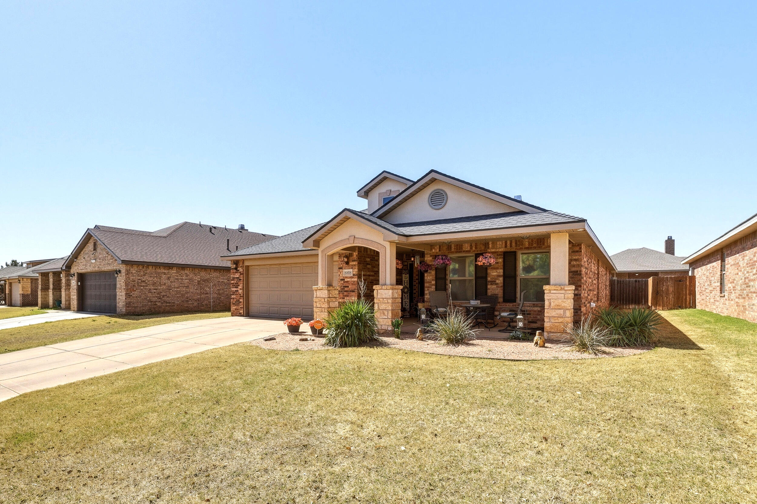 8808 Rochester Avenue Lubbock, TX 79424 - Photo 3 of 27 a front view of house with yard
