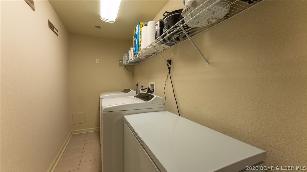 155 Lake Road Camdenton, MO 65020 - Photo 19 of 39 laundry room with extra space