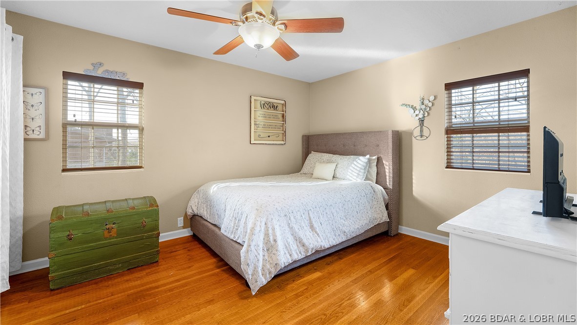 155 Lake Road Camdenton, MO 65020 - Photo 24 of 39 guest bedroom #2 Look at those beautiful hard woo