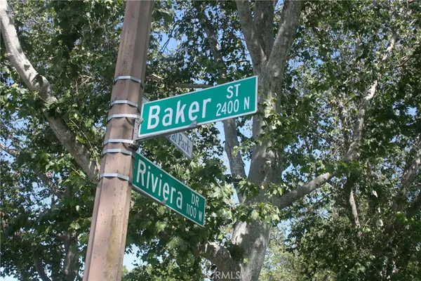 a street sign on a pole on a street