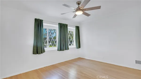 a front view of a house with porch and dining area