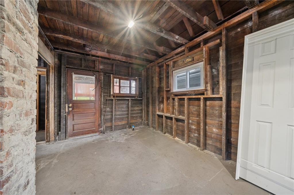 1160 Delaware Street Export, PA 15632 - Photo 16 of 27 a view of an empty room with wooden floor and windows