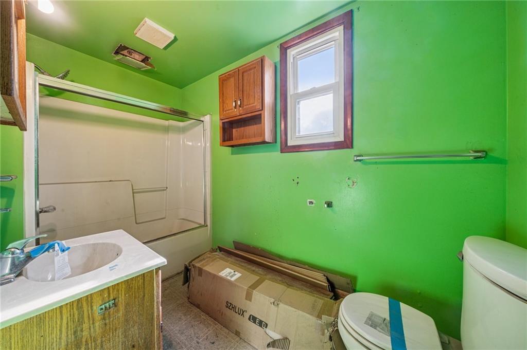 1160 Delaware Street Export, PA 15632 - Photo 20 of 27 a bathroom with a sink toilet and mirror