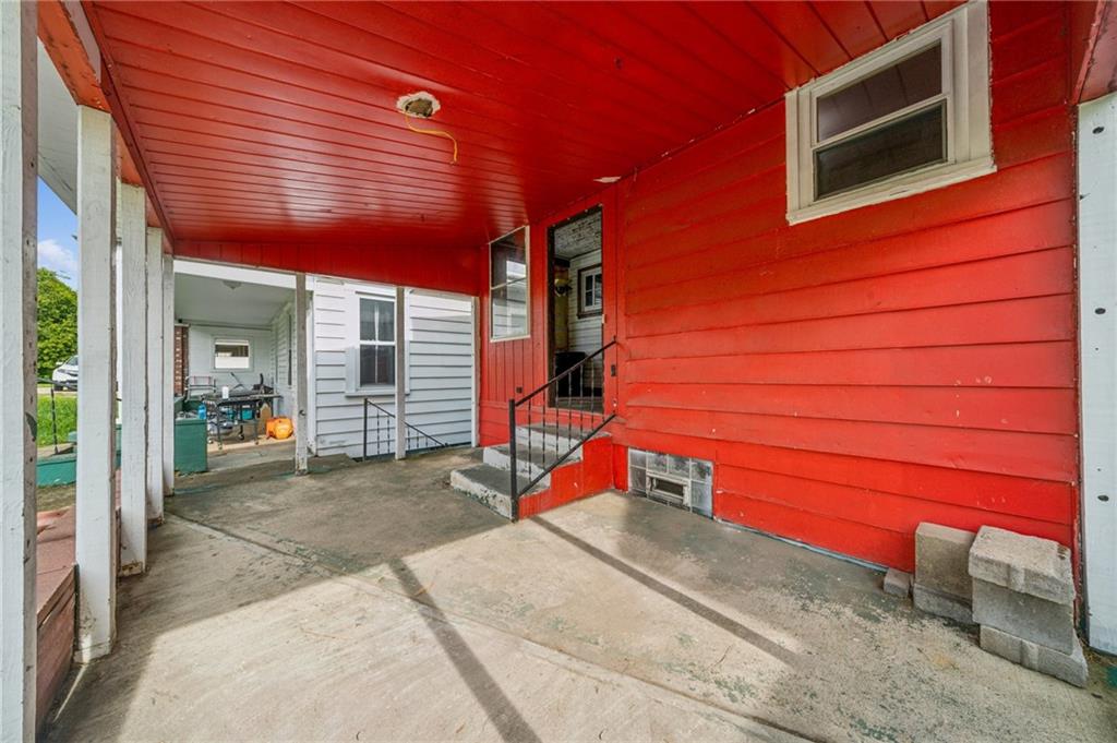 1160 Delaware Street Export, PA 15632 - Photo 25 of 27 a backyard of a house with barbeque oven table and chairs