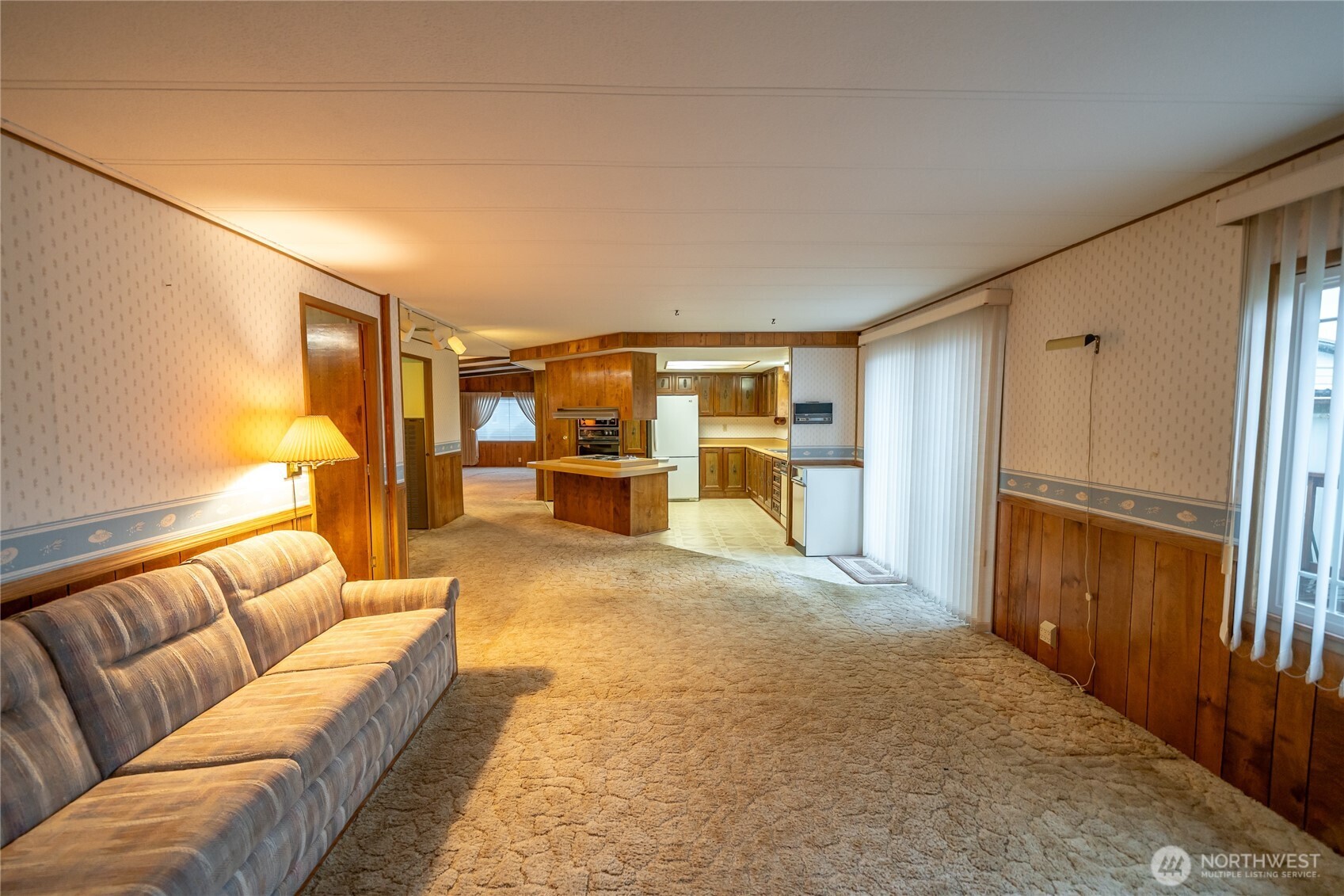 57 Clemons Road, Unit 64 Montesano, WA 98563 - Photo 11 of 35 a living room with furniture and a large window