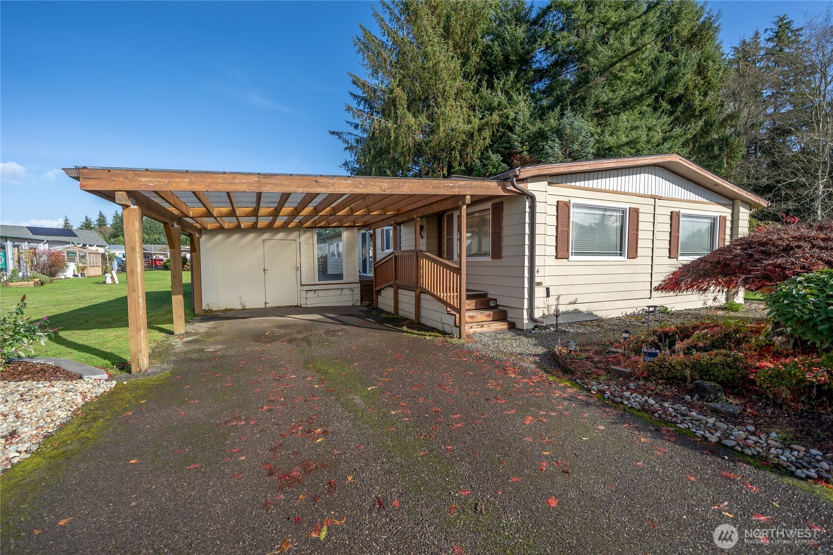 57 Clemons Road, Unit 64 Montesano, WA 98563 - Photo 2 of 35 a front view of a house with garden