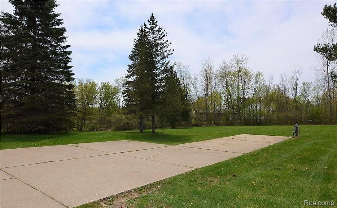 11365 Linden Road Linden, MI 48451 - Photo 9 of 22 EXTRA PARKING~PARKING PAD WITH ELECTRIC & WATER