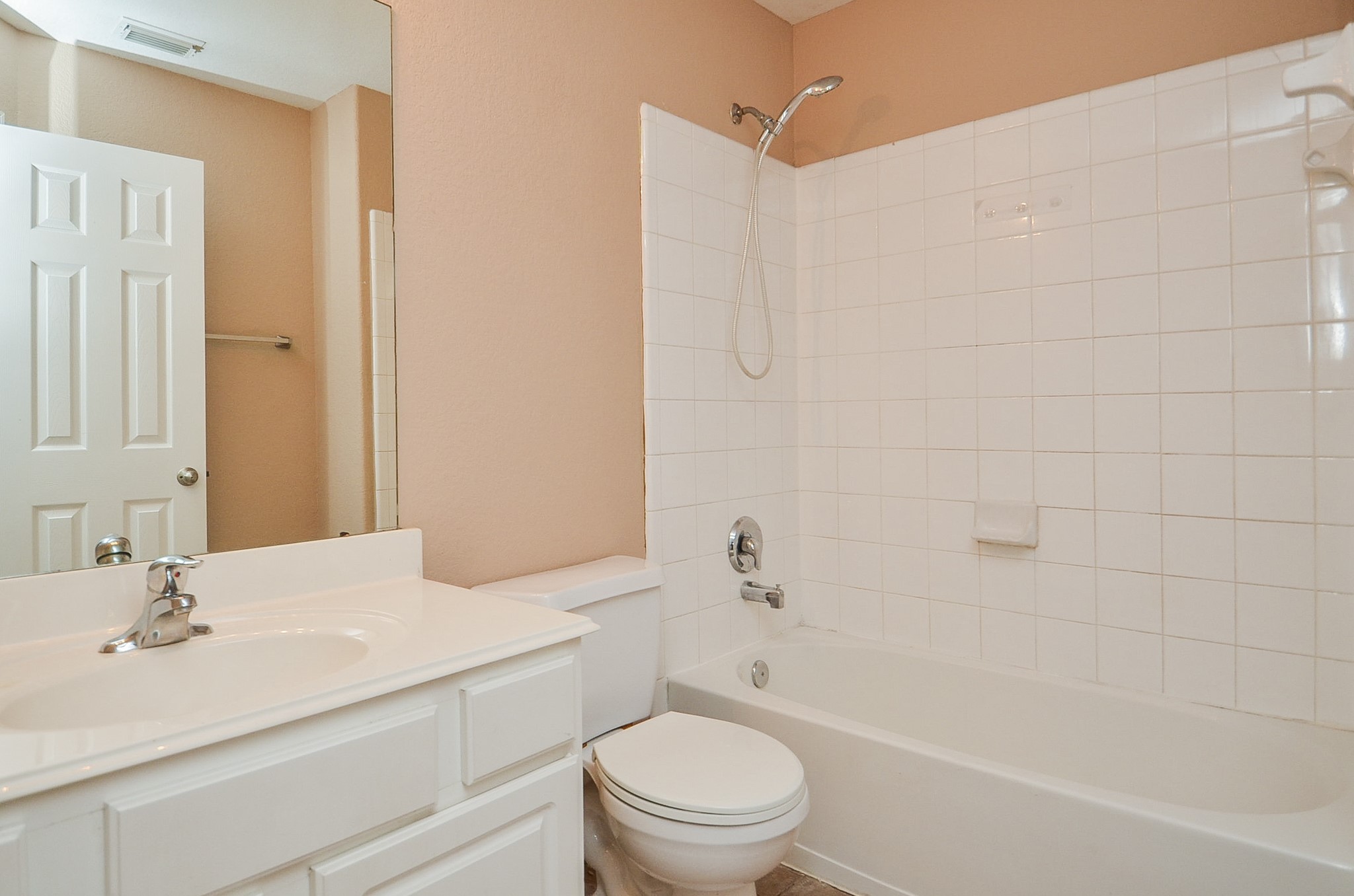 7134 Winston Ranch Parkway Richmond, TX 77406 - Photo 30 of 35 More striking white tile and counter top in a secondary bathroom offers the same creature comforts as its primary counterpart.