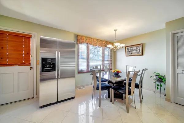 a view of a dining room with furniture