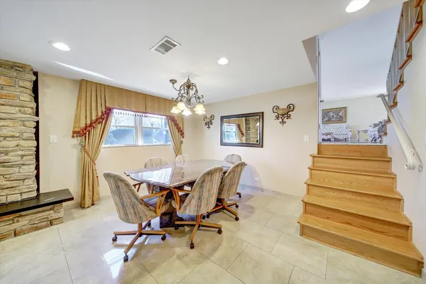 a view of a dining room with furniture