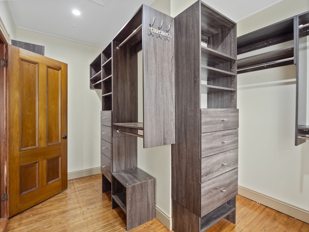2154 Main Street Athol, MA 01331 - Photo 18 of 40 a view of walk in closet with clothes and shoes