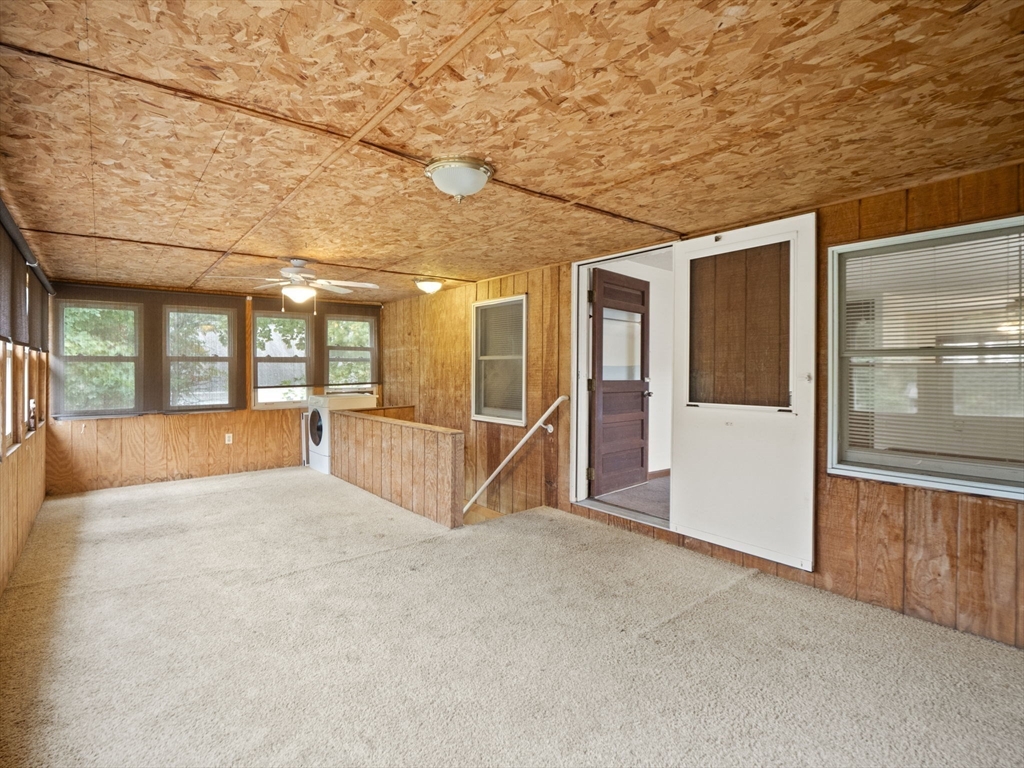 2154 Main Street Athol, MA 01331 - Photo 30 of 40 a view of an empty room with wooden floor and a large window