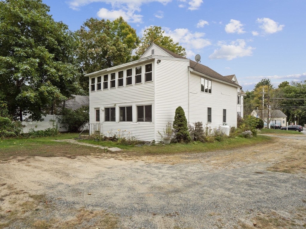 2154 Main Street Athol, MA 01331 - Photo 33 of 40 a view of a house with backyard and trees