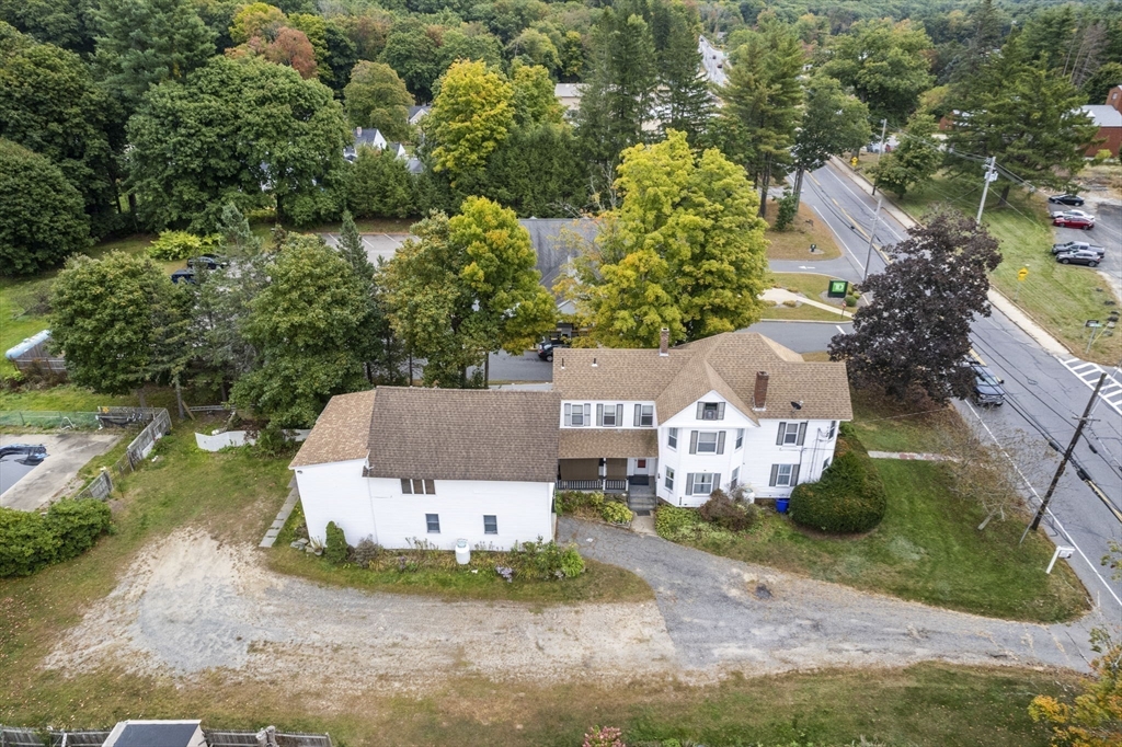 2154 Main Street Athol, MA 01331 - Photo 36 of 40 an aerial view of a house with a yard and greenery