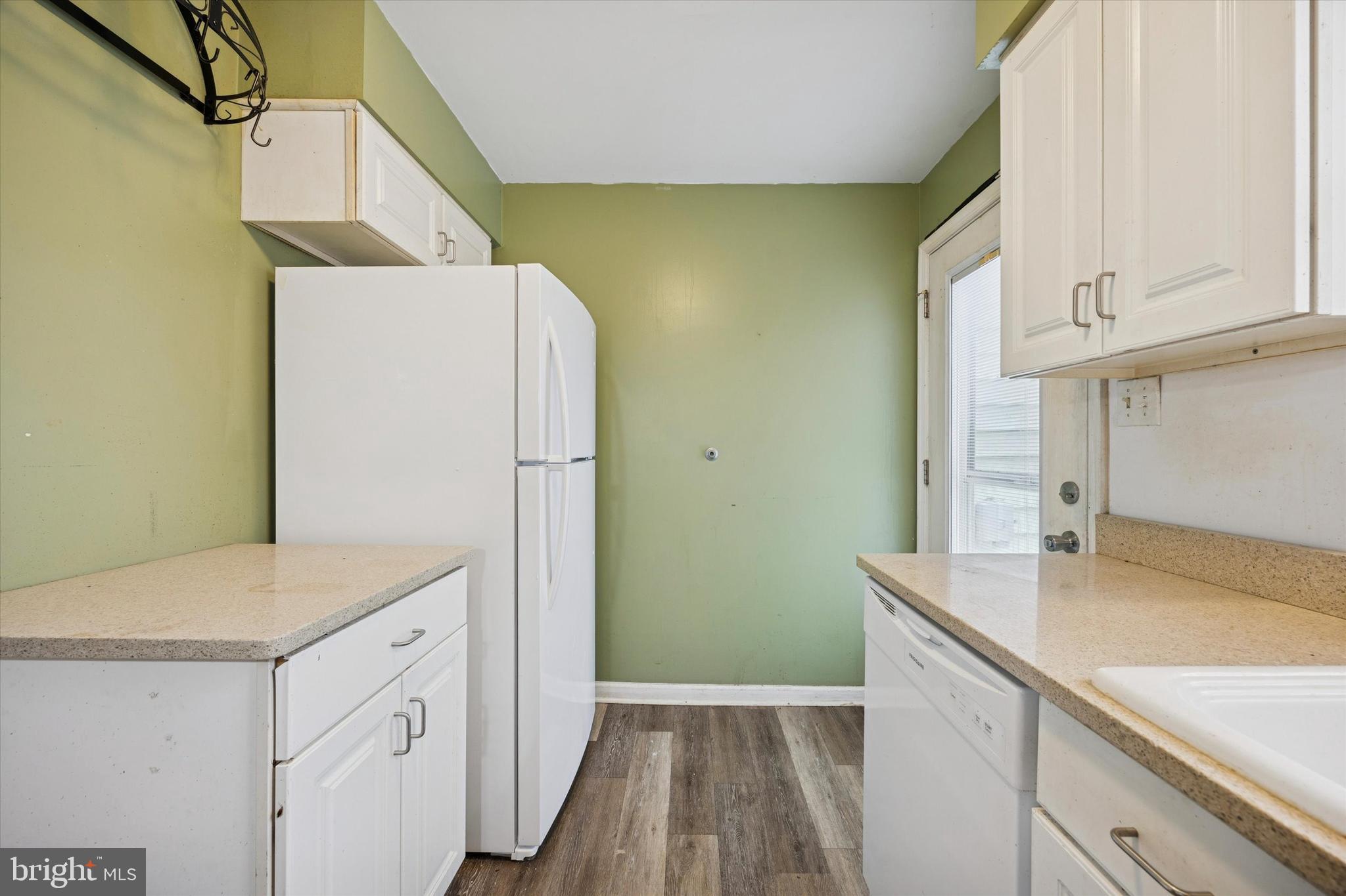 544 Walnut Street Pottstown, PA 19464 - Photo 6 of 14 a utility room with cabinets washer and dryer
