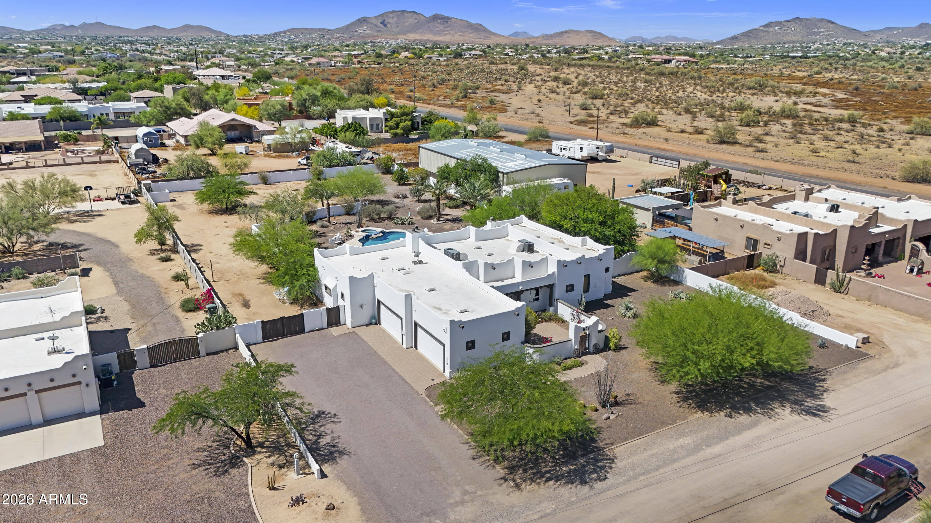 605 West Ridgecrest Road Phoenix, AZ 85086 - Photo 9 of 40 an aerial view of a city with lots of residential buildings
