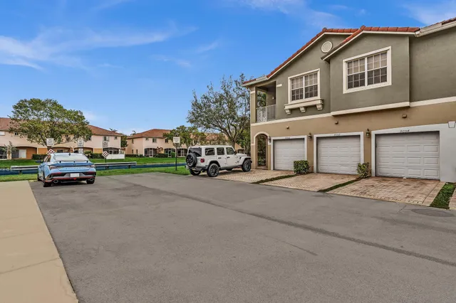a aerial view of a house with a yard