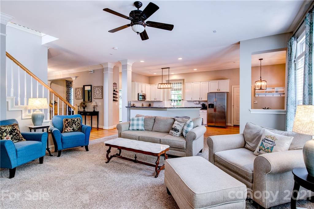 7155 Michael Scott Crossing Fort Mill, SC 29708 - Photo 11 of 41 a living room with furniture and kitchen view