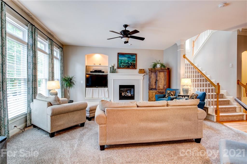 7155 Michael Scott Crossing Fort Mill, SC 29708 - Photo 12 of 41 a living room with furniture fireplace and flat screen tv