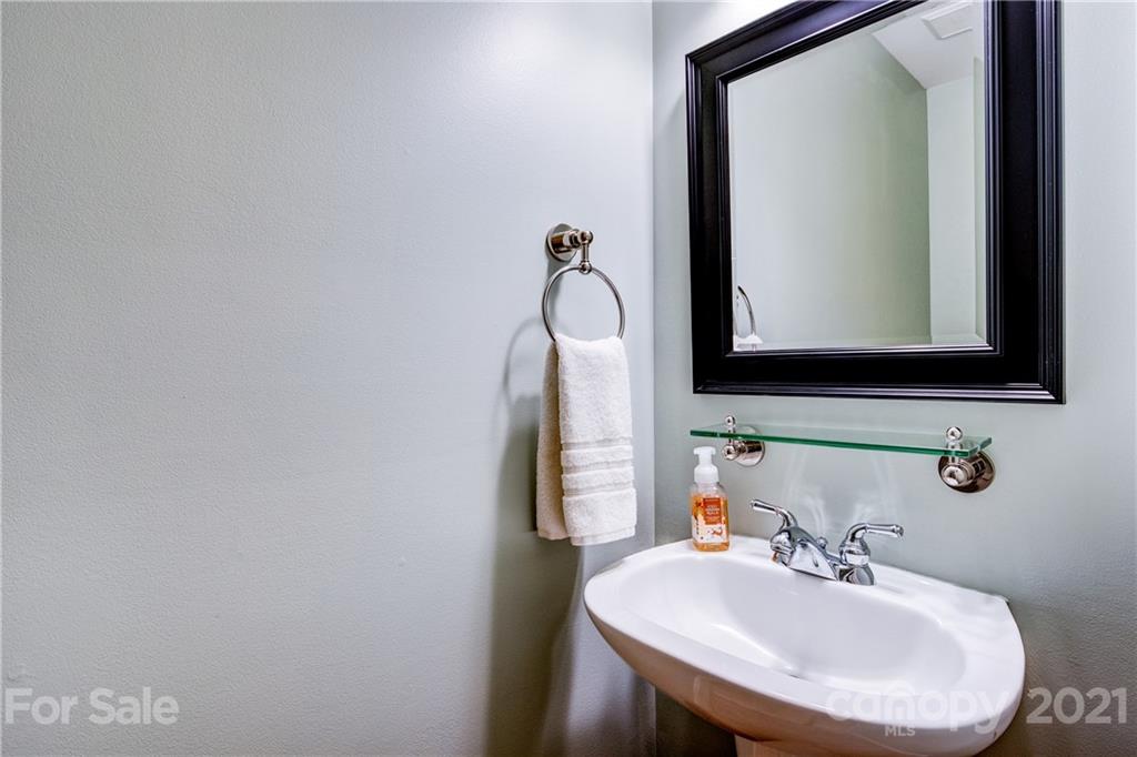 7155 Michael Scott Crossing Fort Mill, SC 29708 - Photo 16 of 41 a bathroom with a sink and a mirror