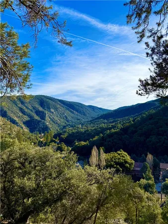 a view of lake with mountain