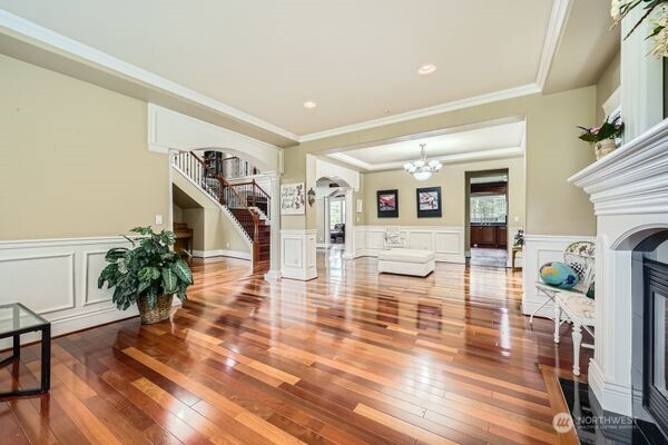 16925 Southeast 224th Street Kent, WA 98042 - Photo 7 of 21 a living room with fireplace furniture and a wooden floor