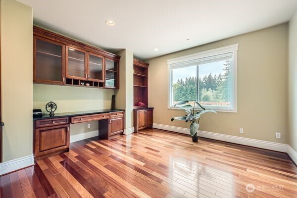 16925 Southeast 224th Street Kent, WA 98042 - Photo 8 of 21 a bedroom with furniture and a window